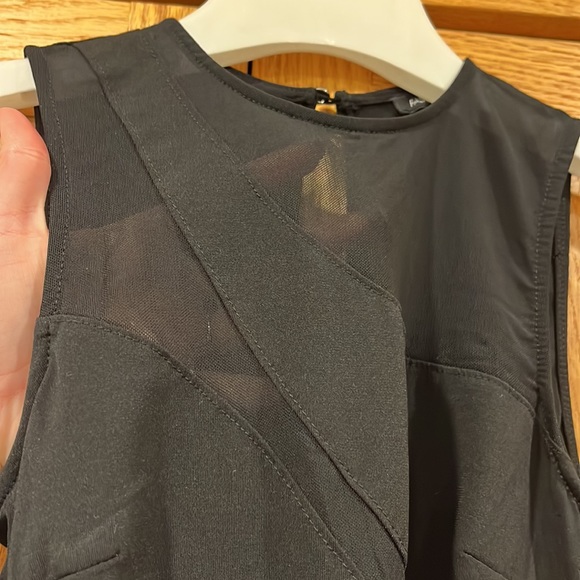 Black cutout body suit, high neck with cutouts on chest and abdomen. - Picture 2 of 4